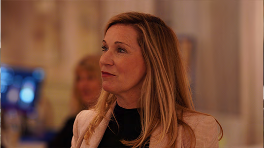 Investor listening to a pitch at a Global Capital Network conference