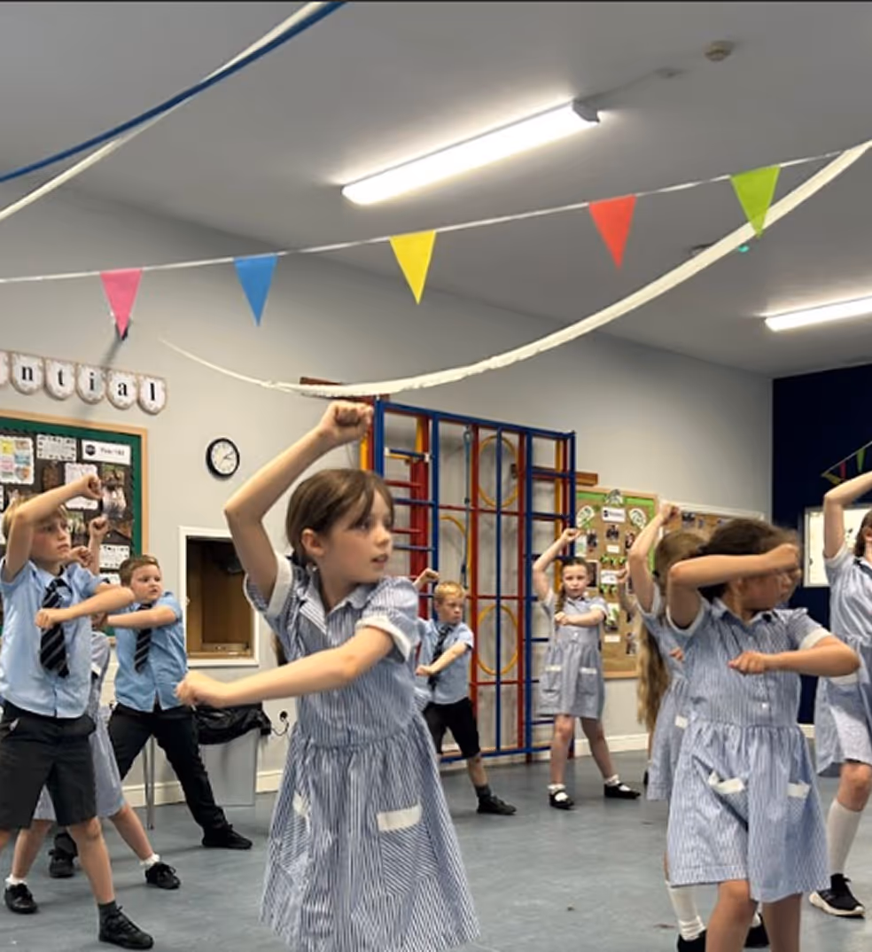 Dance Days proudly displaying its Artsmark Partner logo, supporting high-quality arts education and dancing in schools.