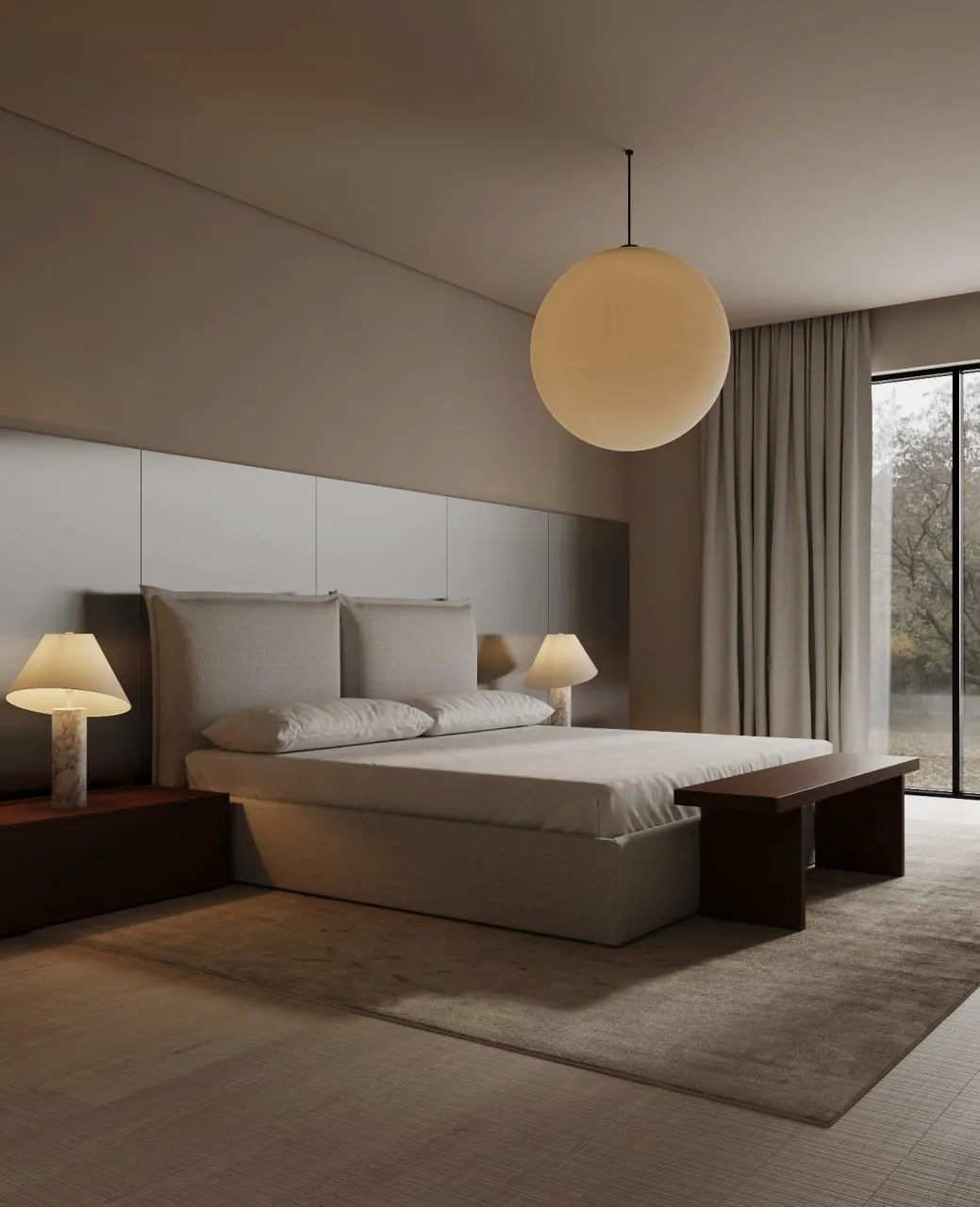 Modern bedroom with a large bed, two bedside lamps on wooden nightstands, a hanging globe light, a wooden bench at the foot of the bed, and floor-to-ceiling windows with curtains.