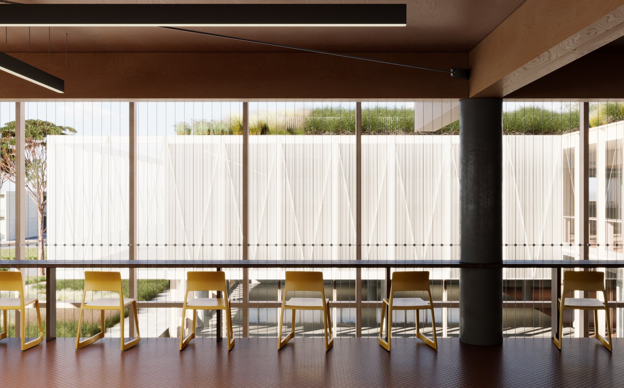 Timber-floored interior with yellow chairs along a long bench, facing full-height glazing with pleated white screens and planting beyond.
