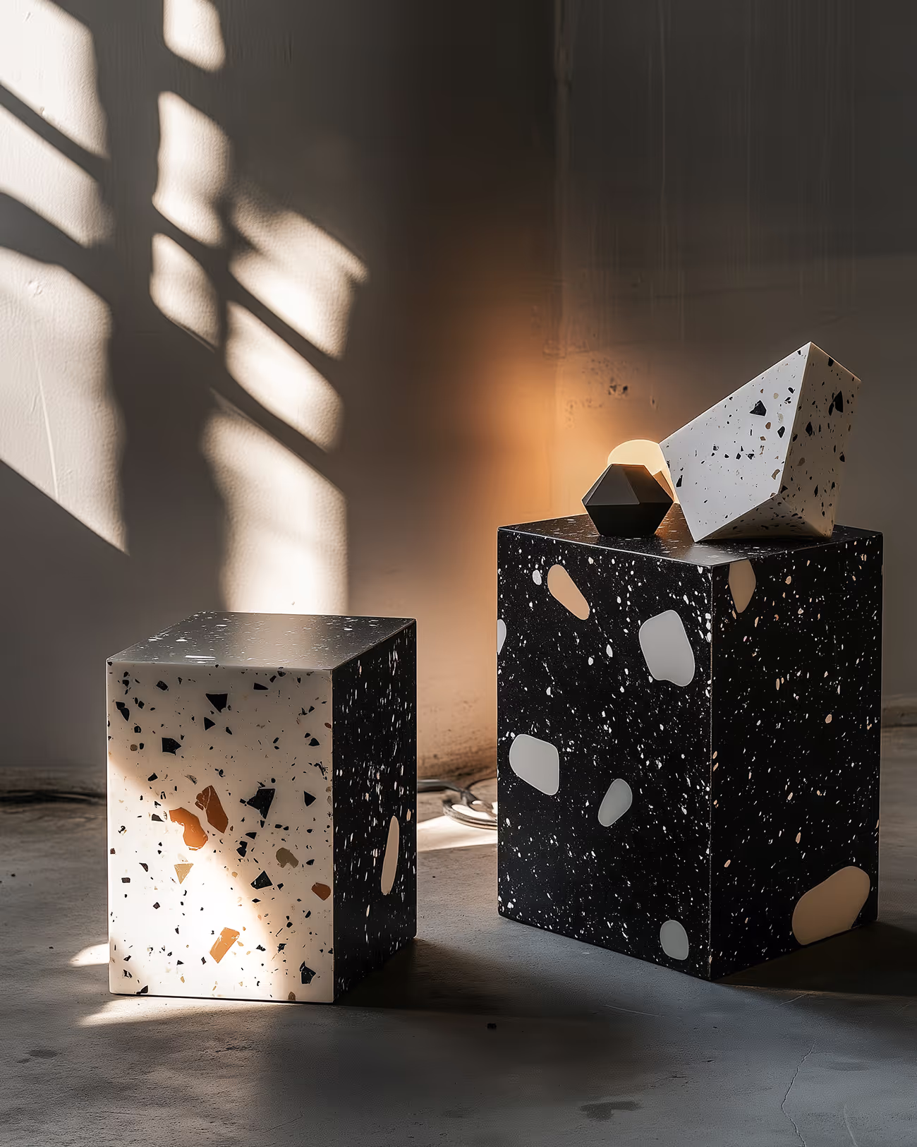 A black and white cubes with white and black speckled designs