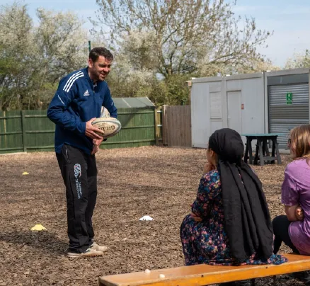 Bridge School Malvern - Teacher and pupils doing outdoor sports