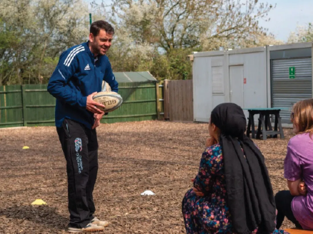 Bridge School Malvern - Teacher teaching outdoor sports
