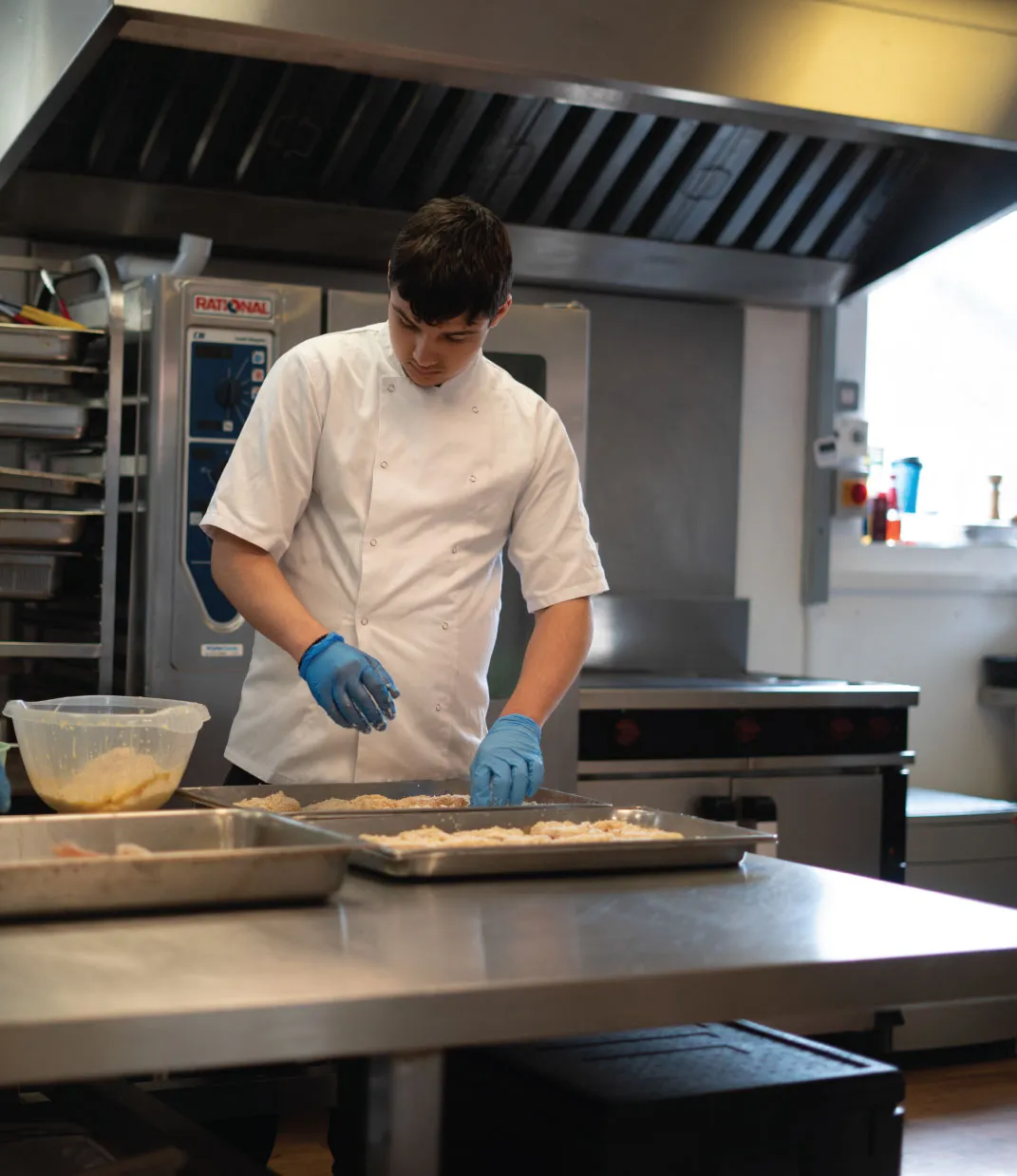 Bridge School Malvern - Student prepping food in kitchen