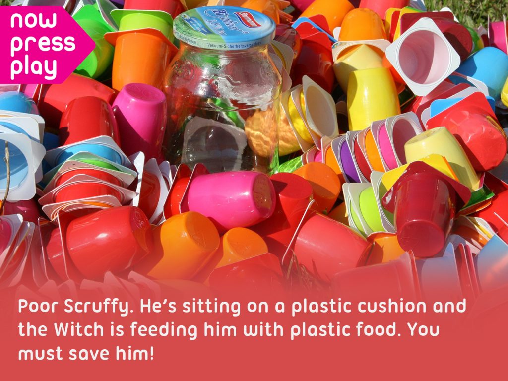 A pile of used plastic yoghurt cartons being recycled, from Now Press Play's Everyday Materials Experience. Caption: Poor Scruffy. He's sitting on a plastic cushion and the Witch is feeding him with plastic food. You must save him!