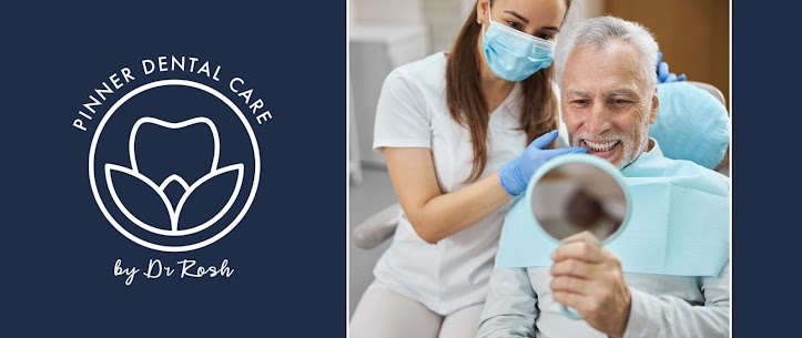 Dental professional assisting smiling patient during dental examination