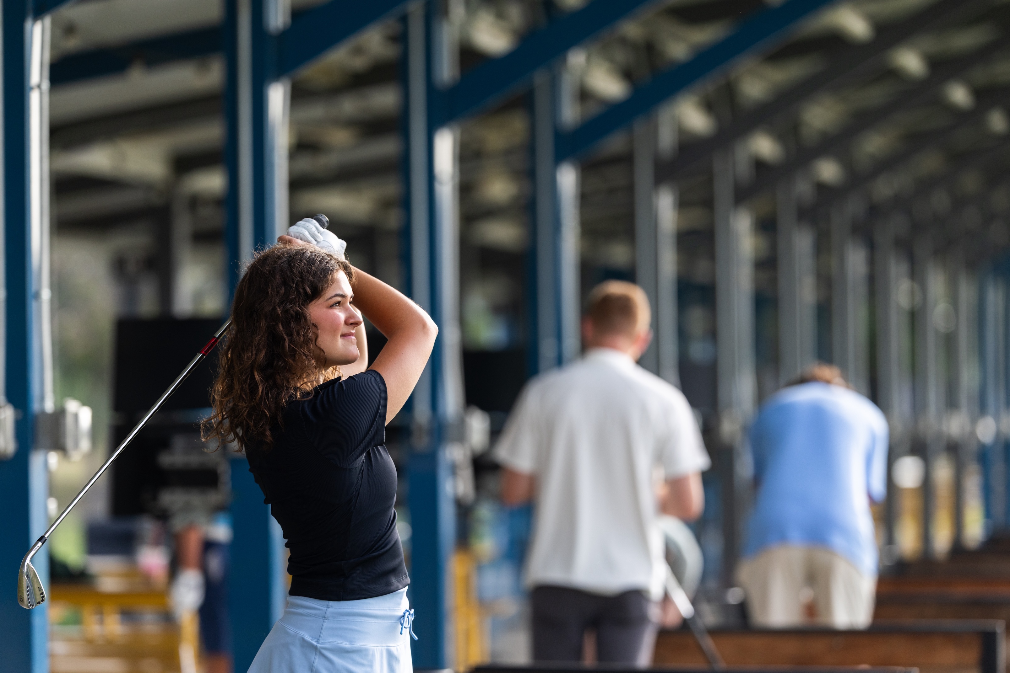 Golfers at the range