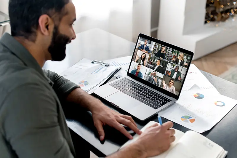 Business leader in team video conference showcasing collaborative RPO hiring process with global recruitment partners