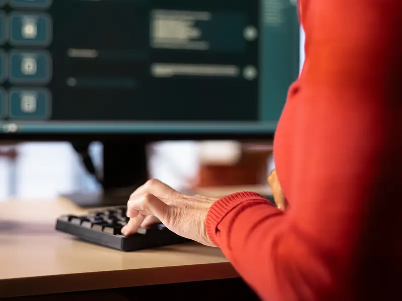 Professional developer typing on keyboard building Rails applications through Somewhere's global talent network