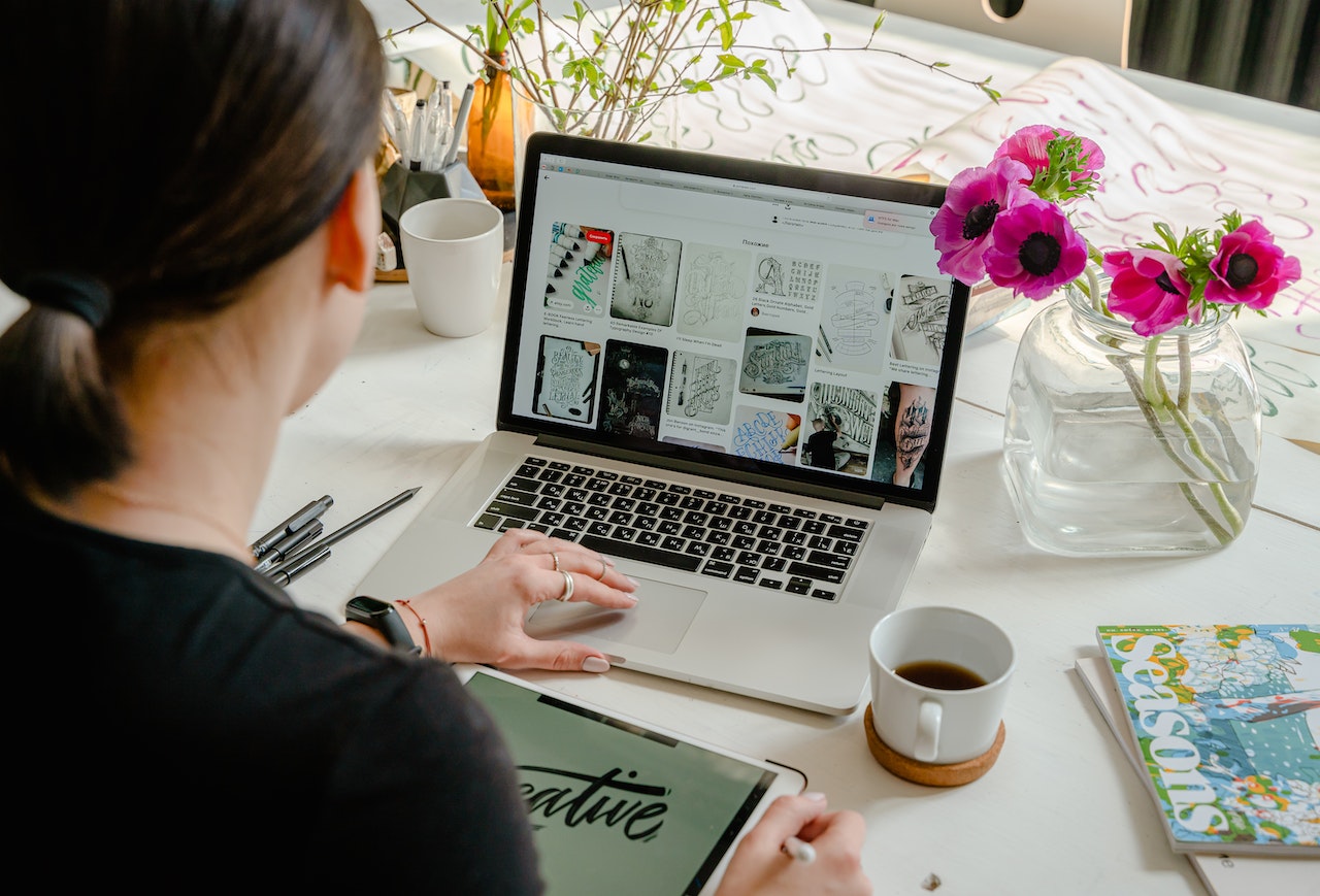 A graphic designer searches for pegs online