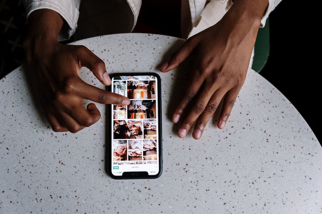 A person scrolling through their camera roll