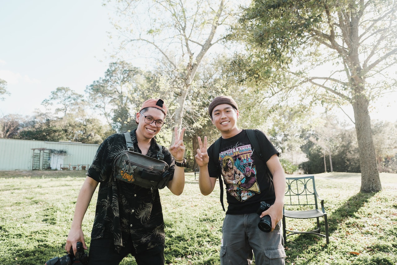 Two Filipino photographers smile for the camera