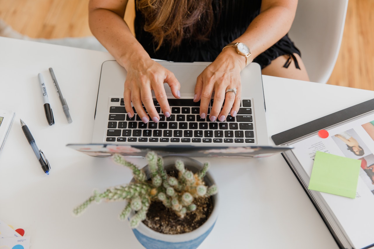 An assistant entering data into the company's CRM