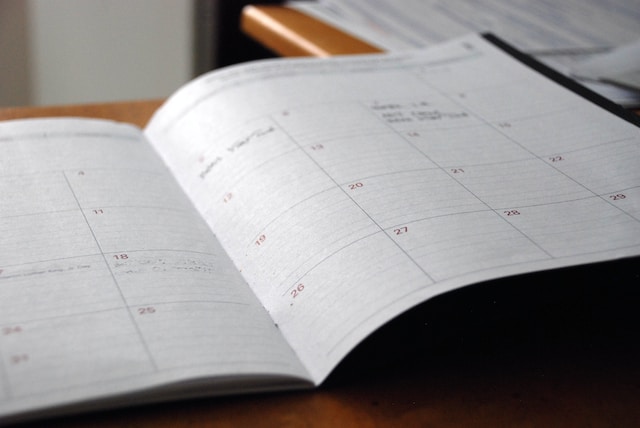 An open daily planner on a desk