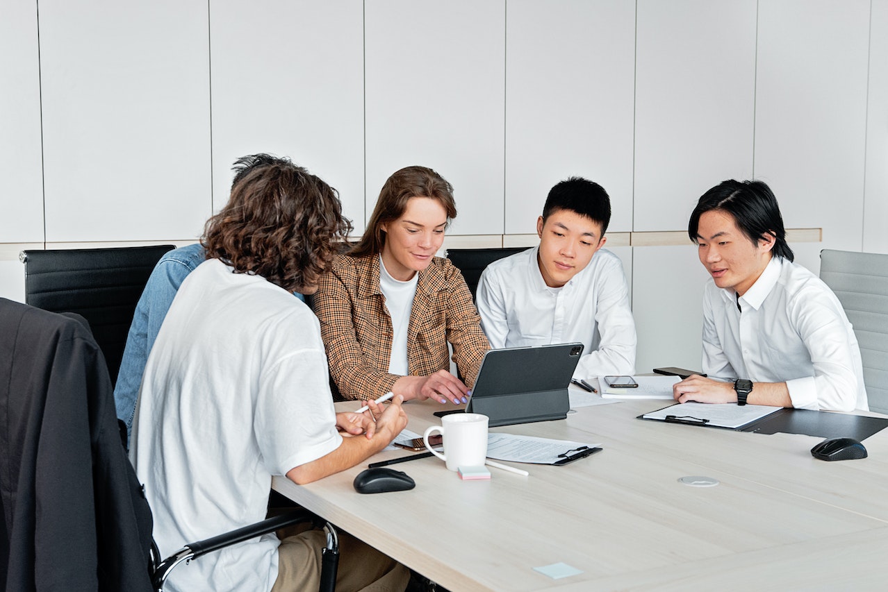 A group of young people in a meeting