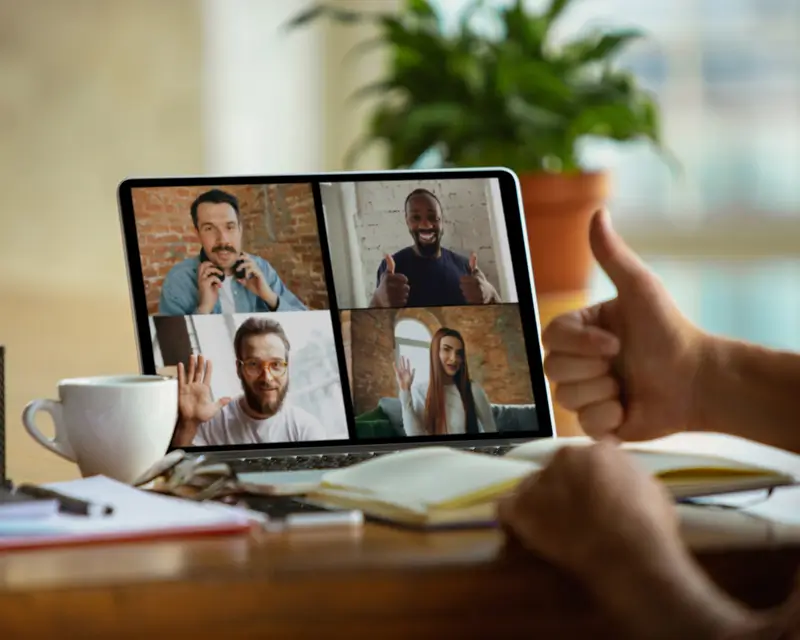 Diverse global team meeting via video showcasing Somewhere's international talent collaboration capabilities