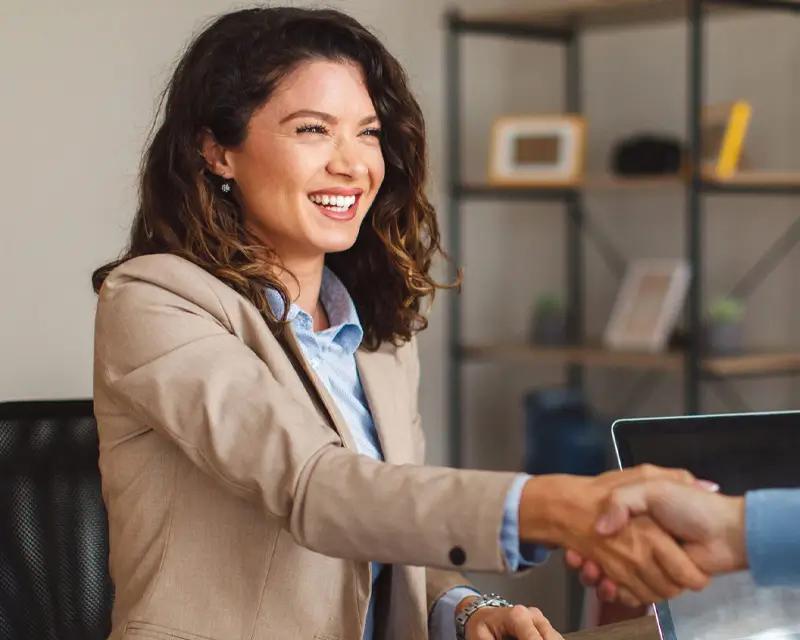 Professional client specialist closing successful partnership deal with US company through Somewhere's global talent network