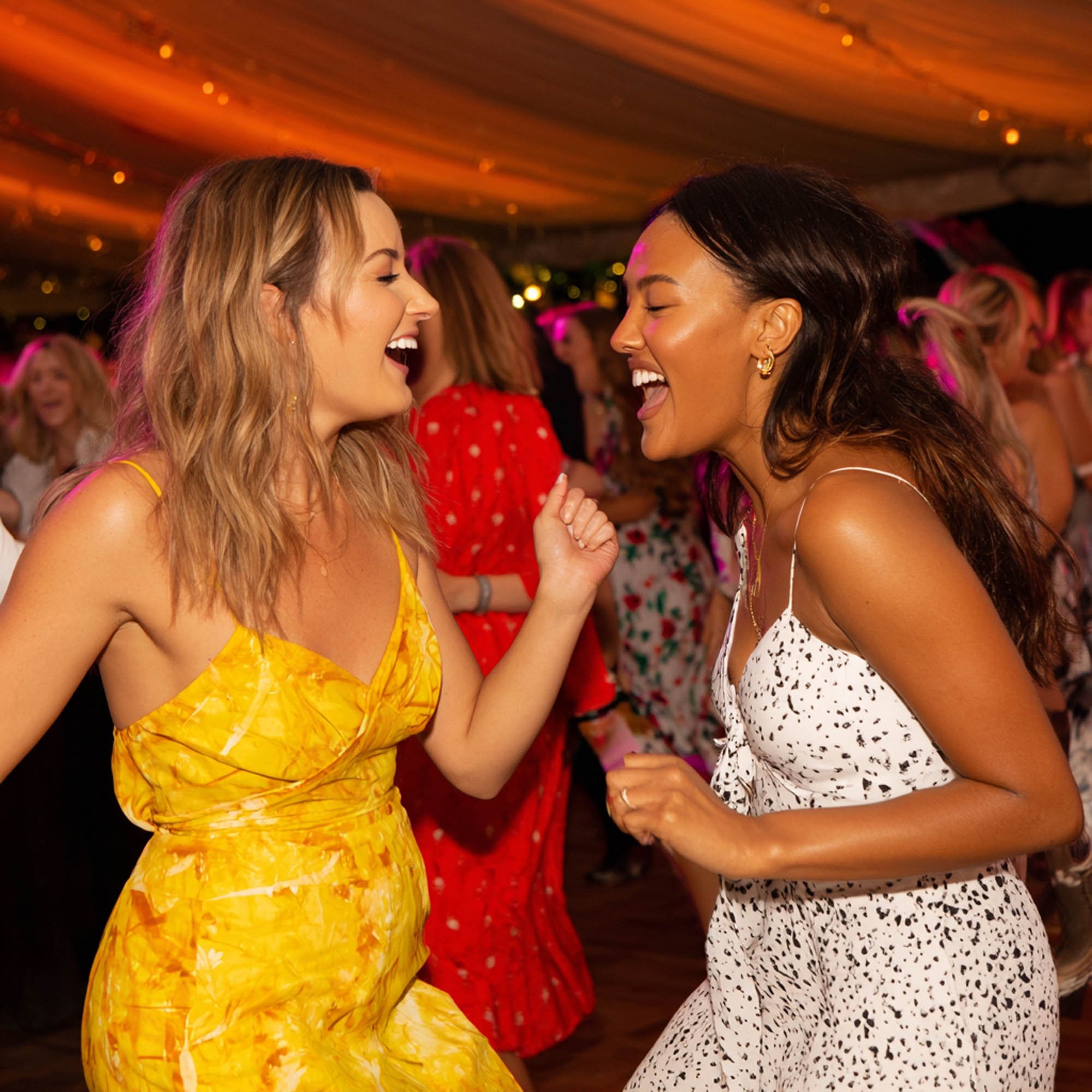 Friends dancing and celebrating at a party
