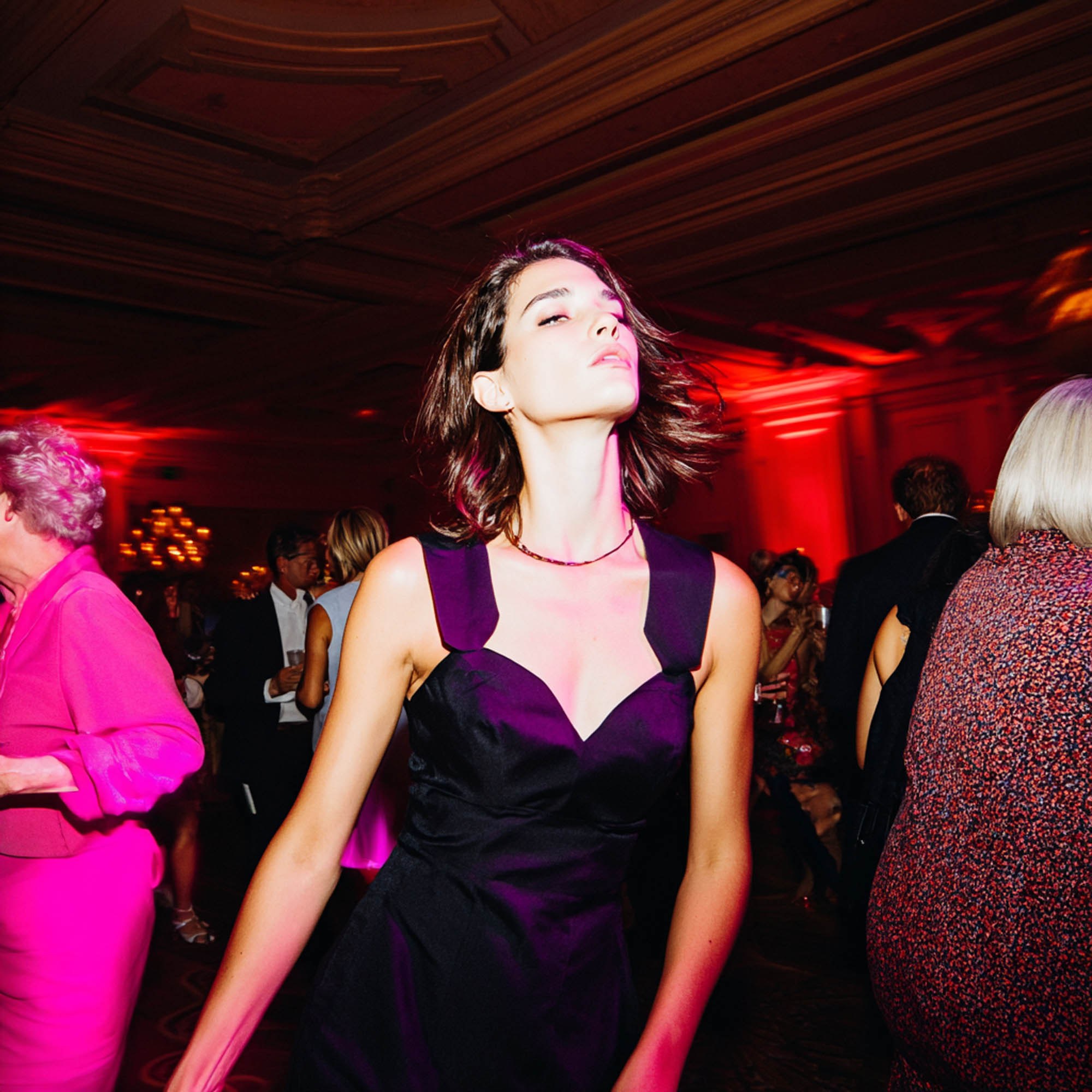 Woman dancing at a lively party