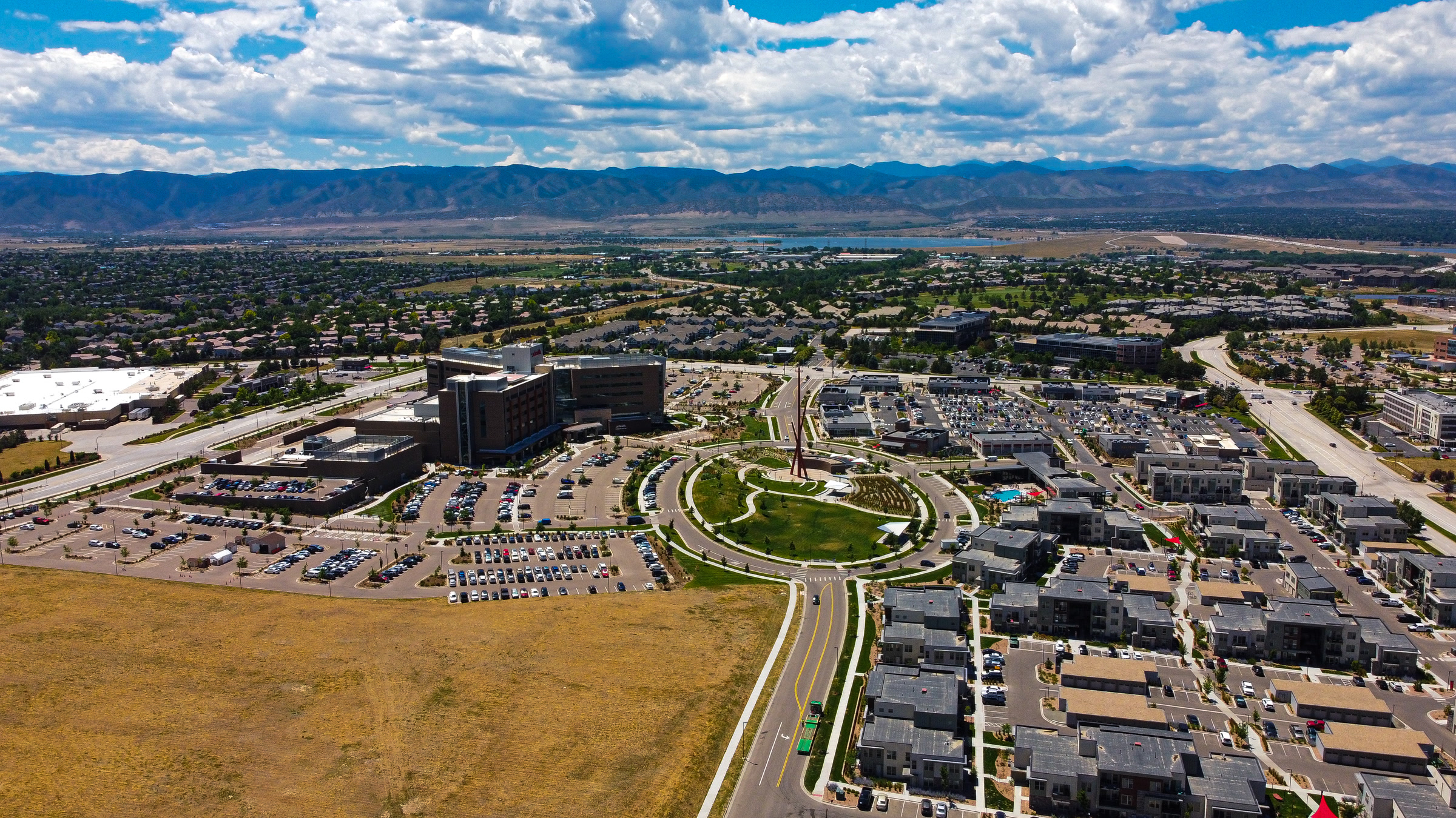 Summer aerial over Highlands Ranch with the Front Range on the horizon
