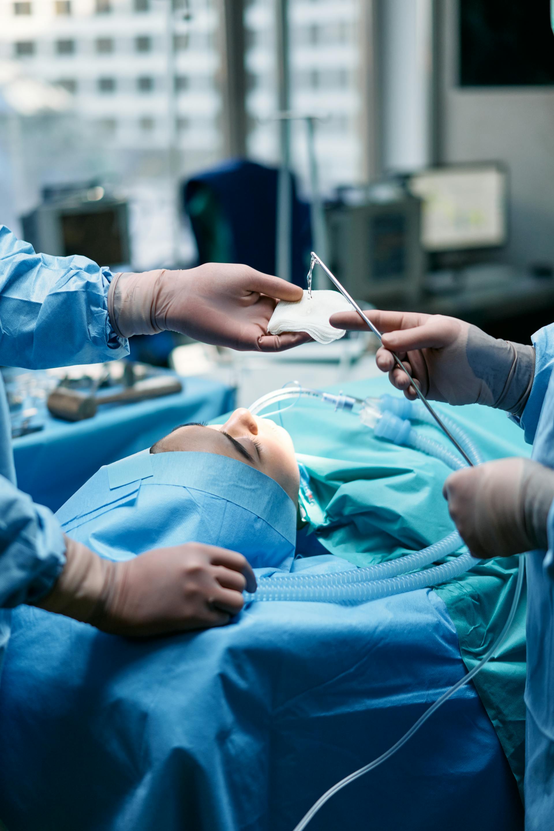 surgeons operating a patient