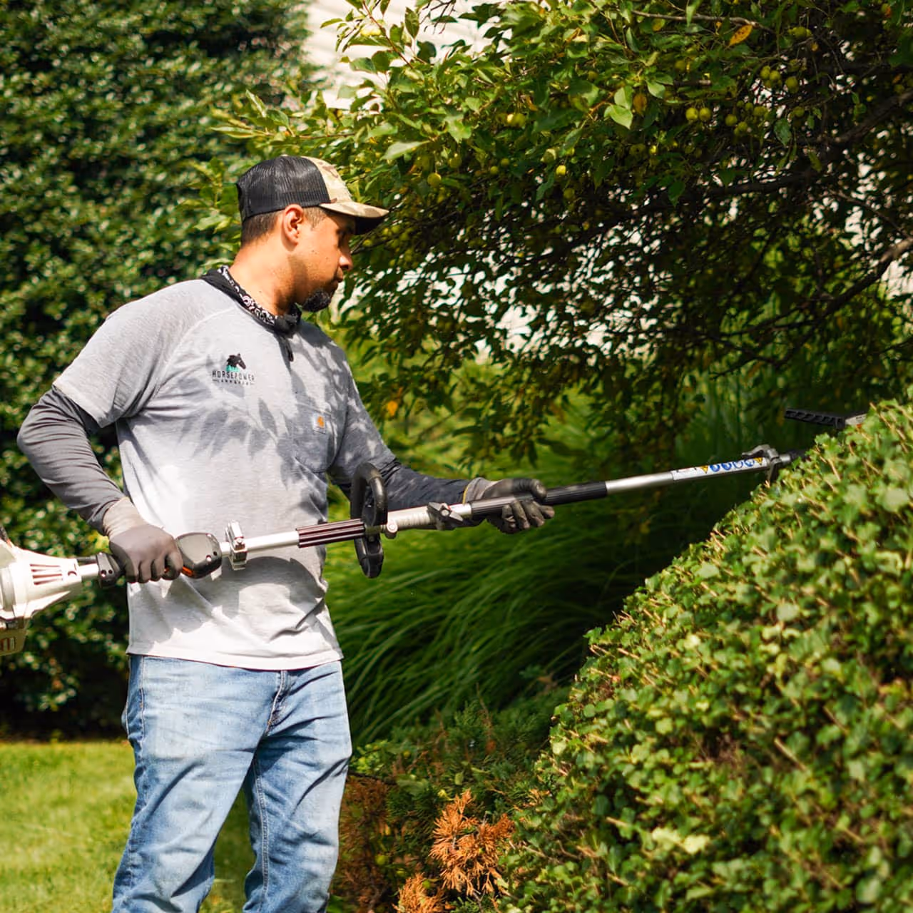 Lawn maintenance crew edging and trimming yard Hershey PA near me