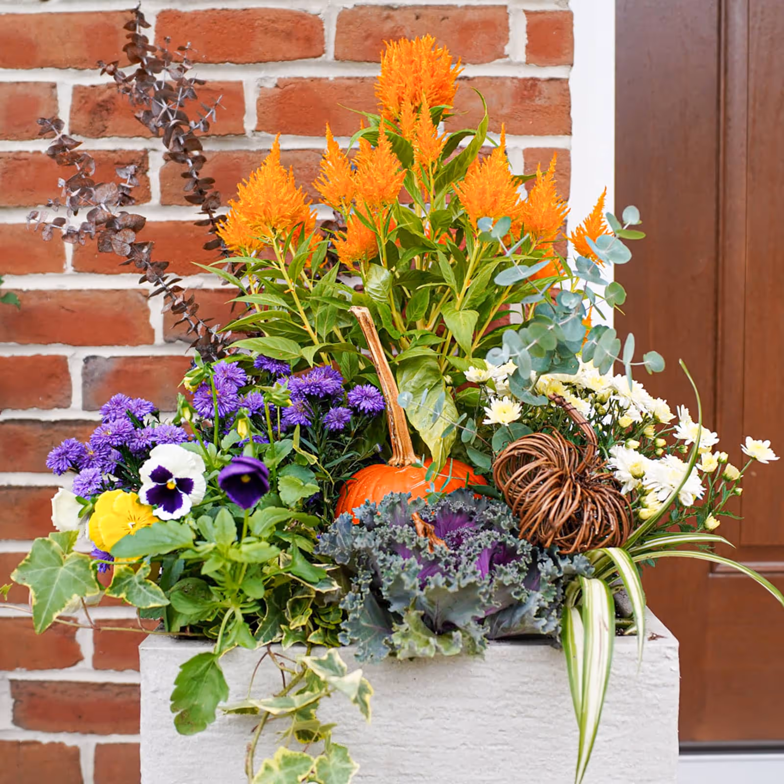 Custom spring and fall flower pots and planters Hershey PA Horse Power Lawn and Home