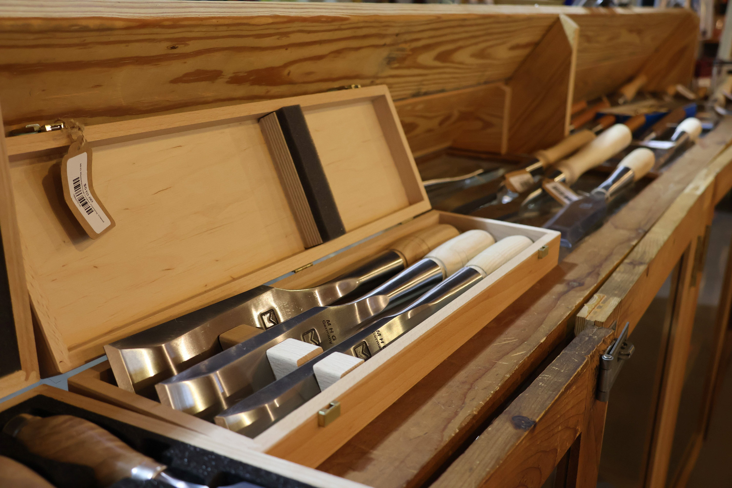 Aerial map of shelter campus with trails, pond, buildings, and green spaces