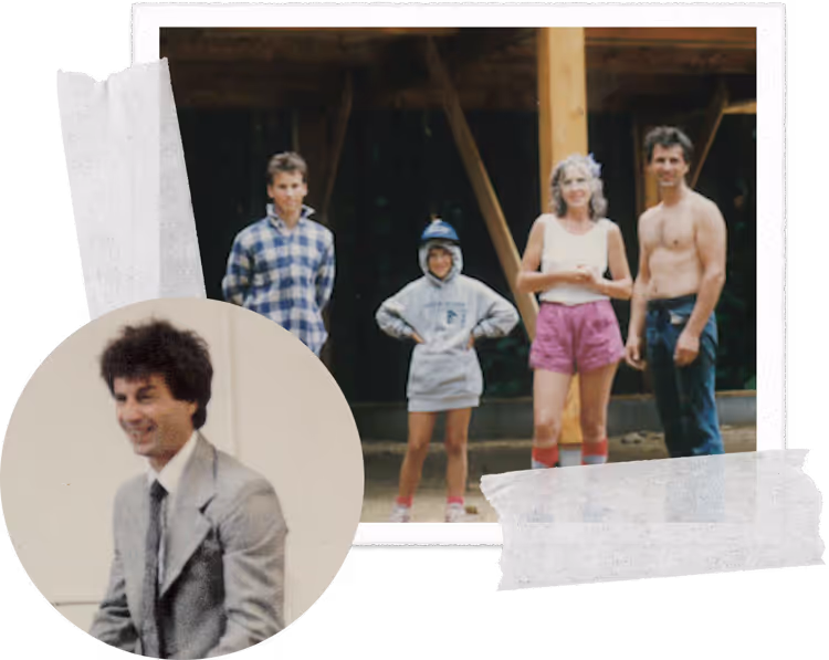 Four people in casual 1980s attire standing outside wooden structure