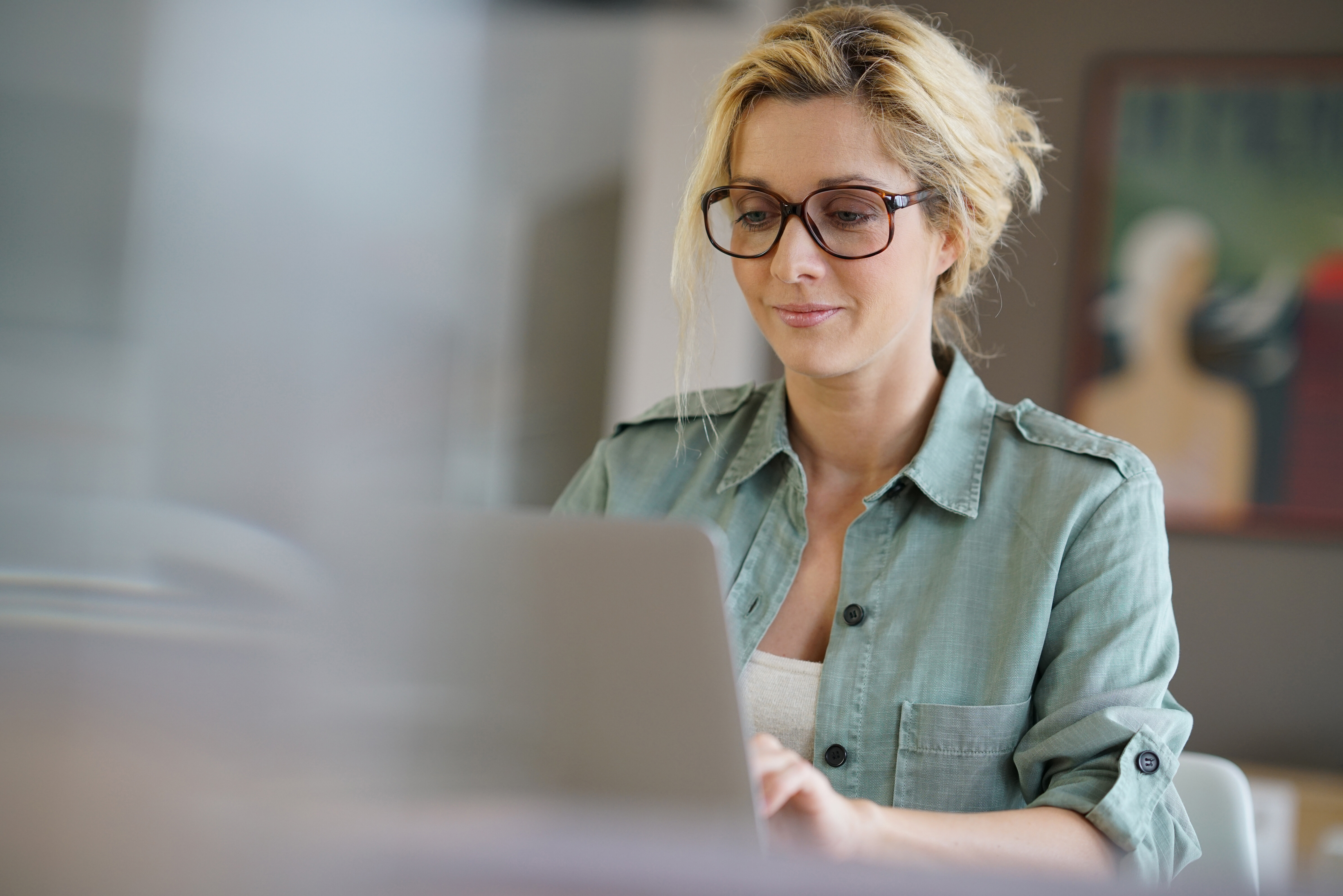 person on computer stock image