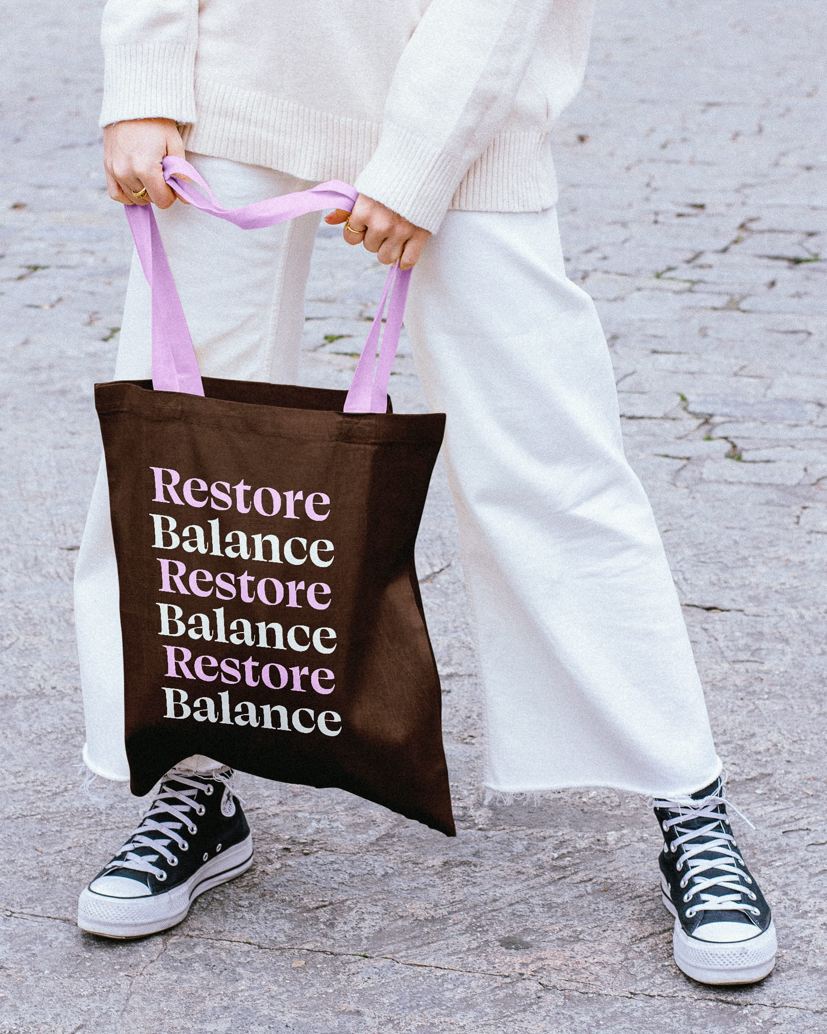 Yellow can of Tucutucu Cold Brew Café on a stone slab with coffee beans and an air plant beside it.