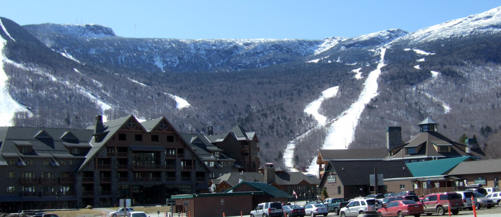 Stowe, Vermont, with ski trails on the mountains above the village