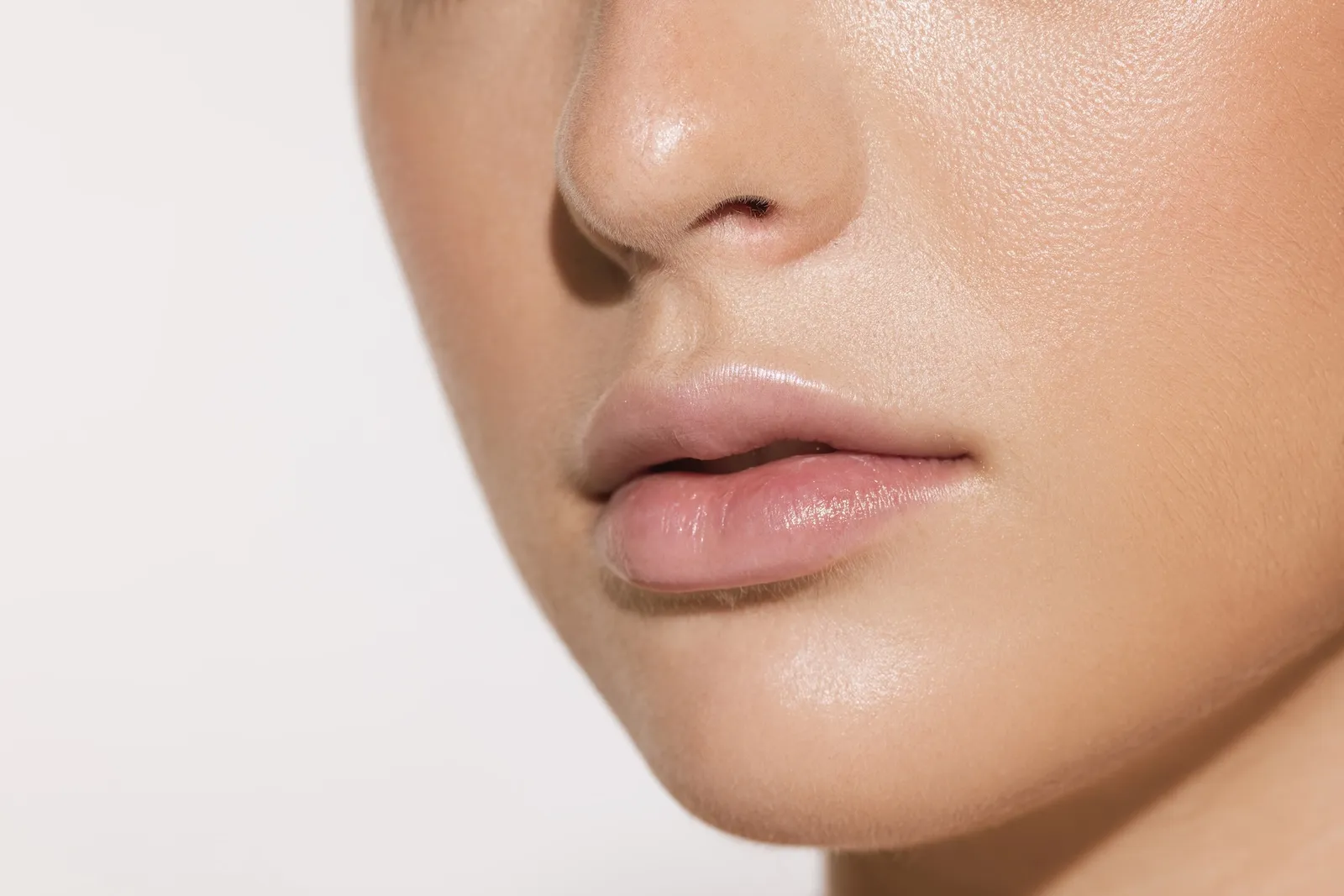 woman receiving a cosmetic injection in the lip area for lip filler by newday medspa in jacksonville