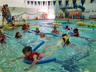 FREE Family Swim event for ALL Lopezians! Come make a SPLASH with FLIP