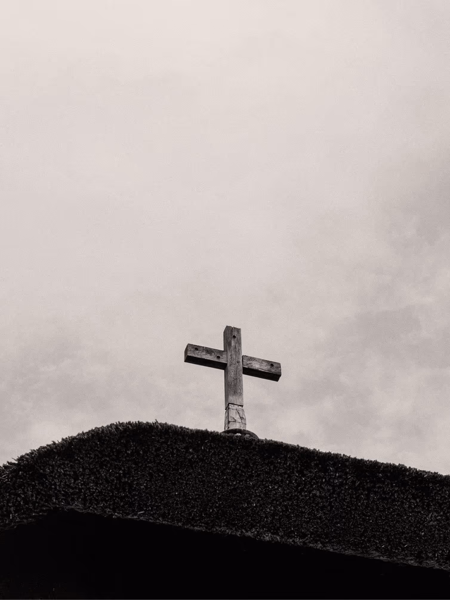Grand cathedral interior with soaring ceilings, arches, and filtered light.