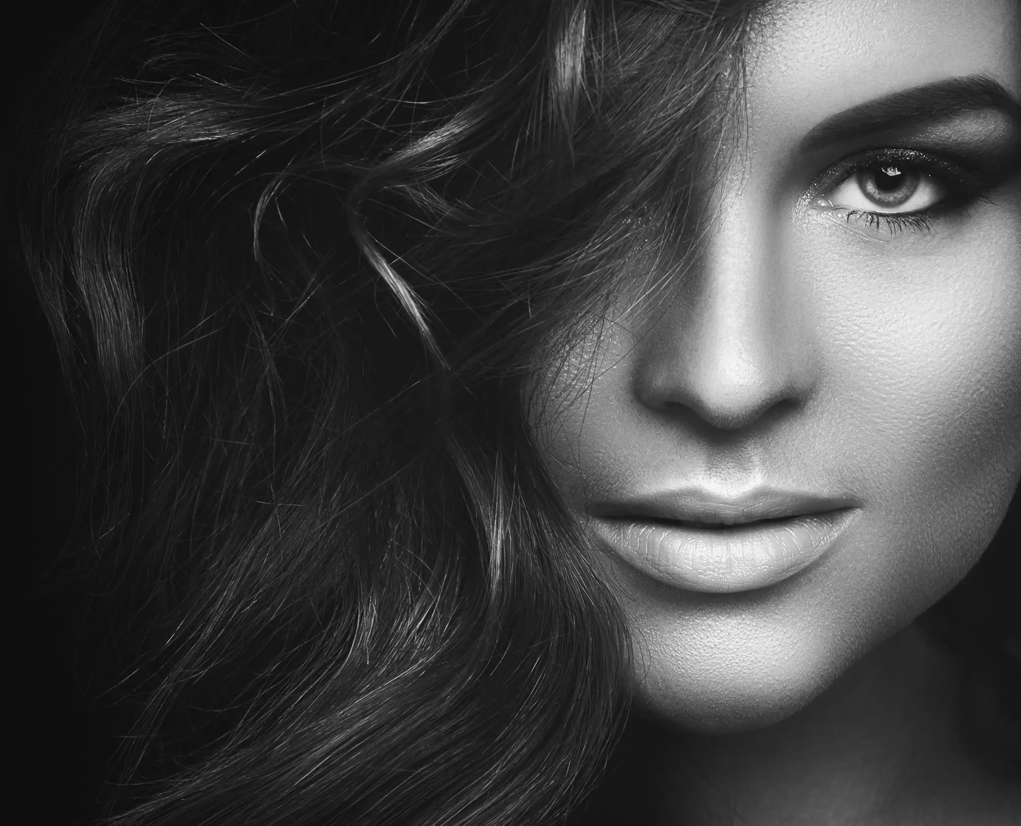 woman looking at camera, black and white
