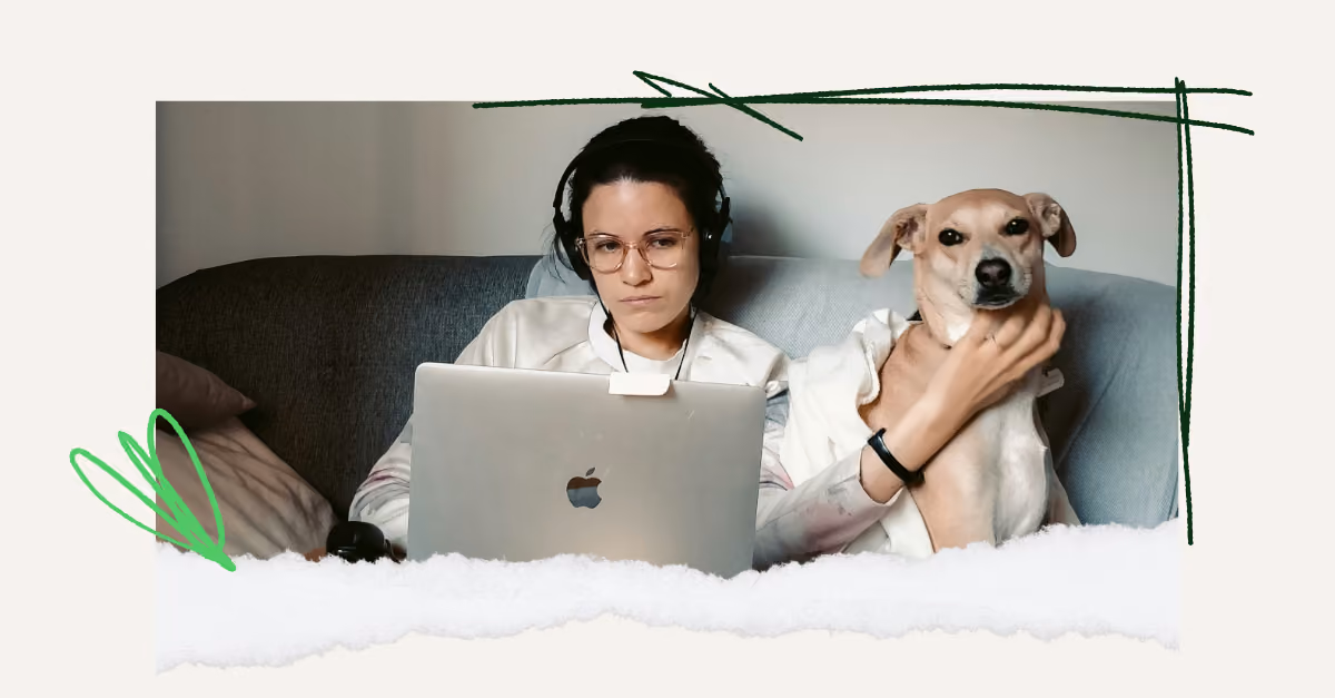 A worker enjoying the company of her dog as she works from home, after her employer learned how to hire remote employees.