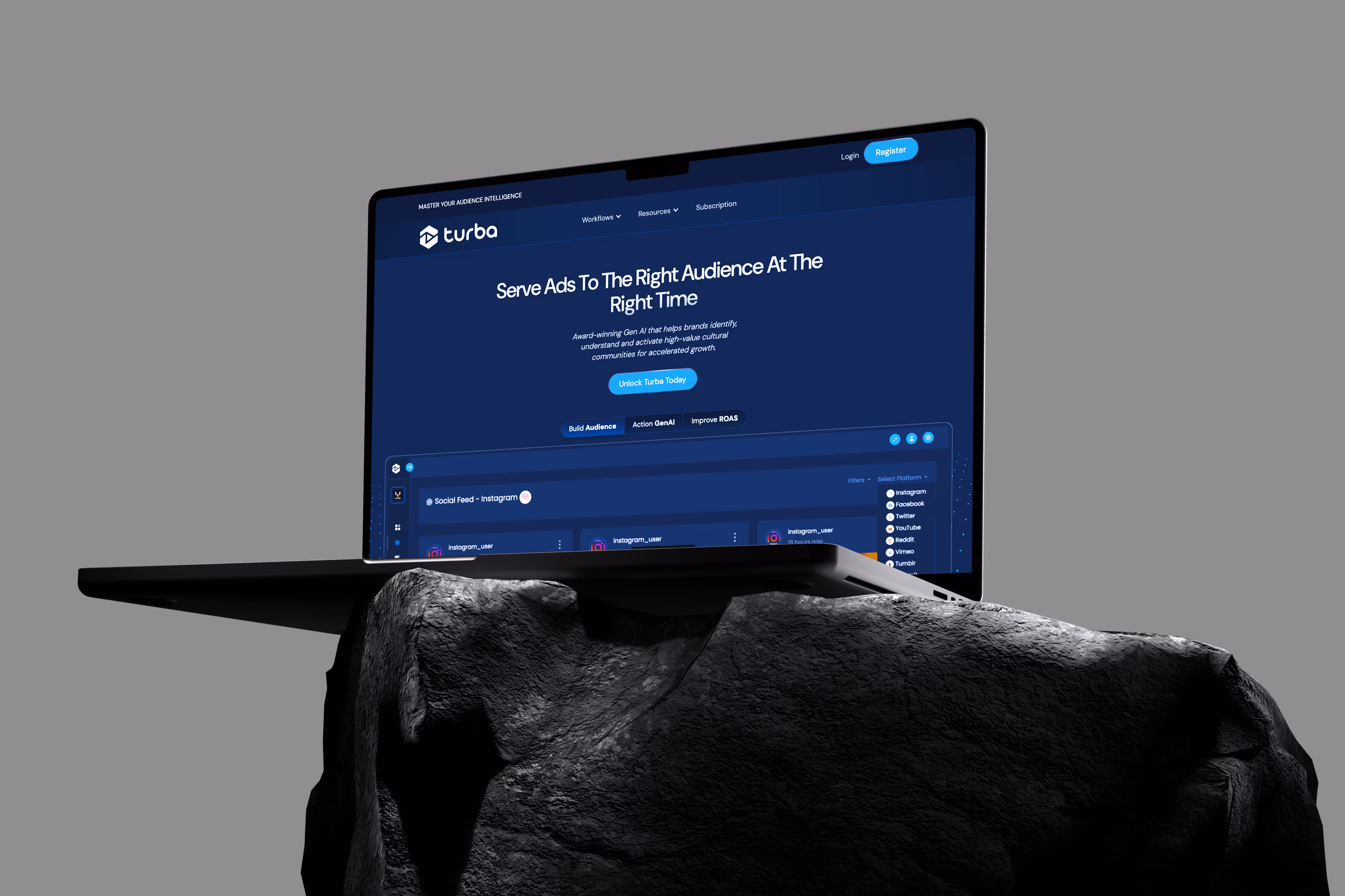 Laptop mockup resting on a dark rock, displaying the Turba website — a dark blue ad management platform designed to help businesses serve ads to the right audience at the right time.