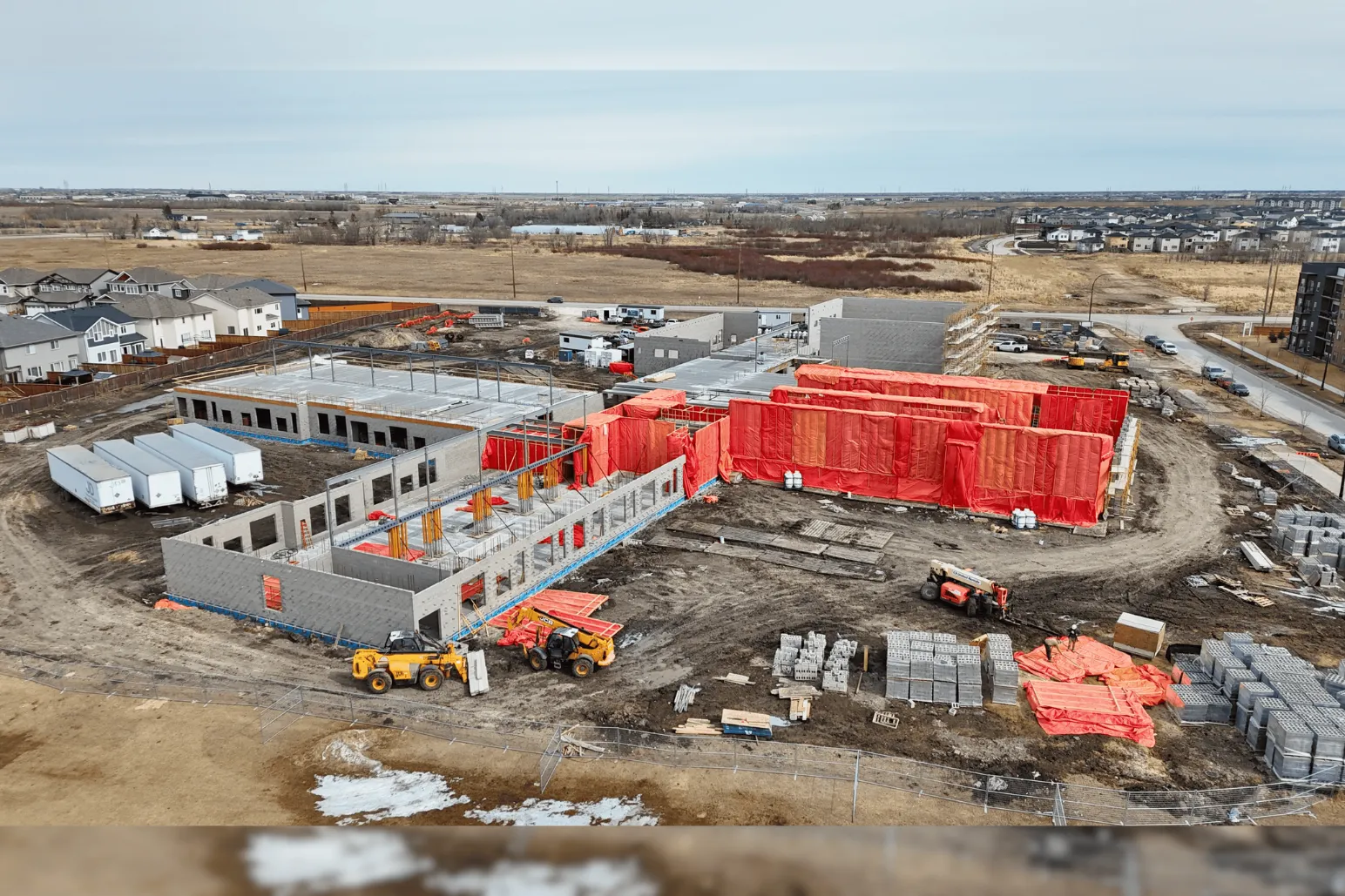 Tyler Clegg from Parkwest Projects discussing École Mino Pimatisiwin school construction