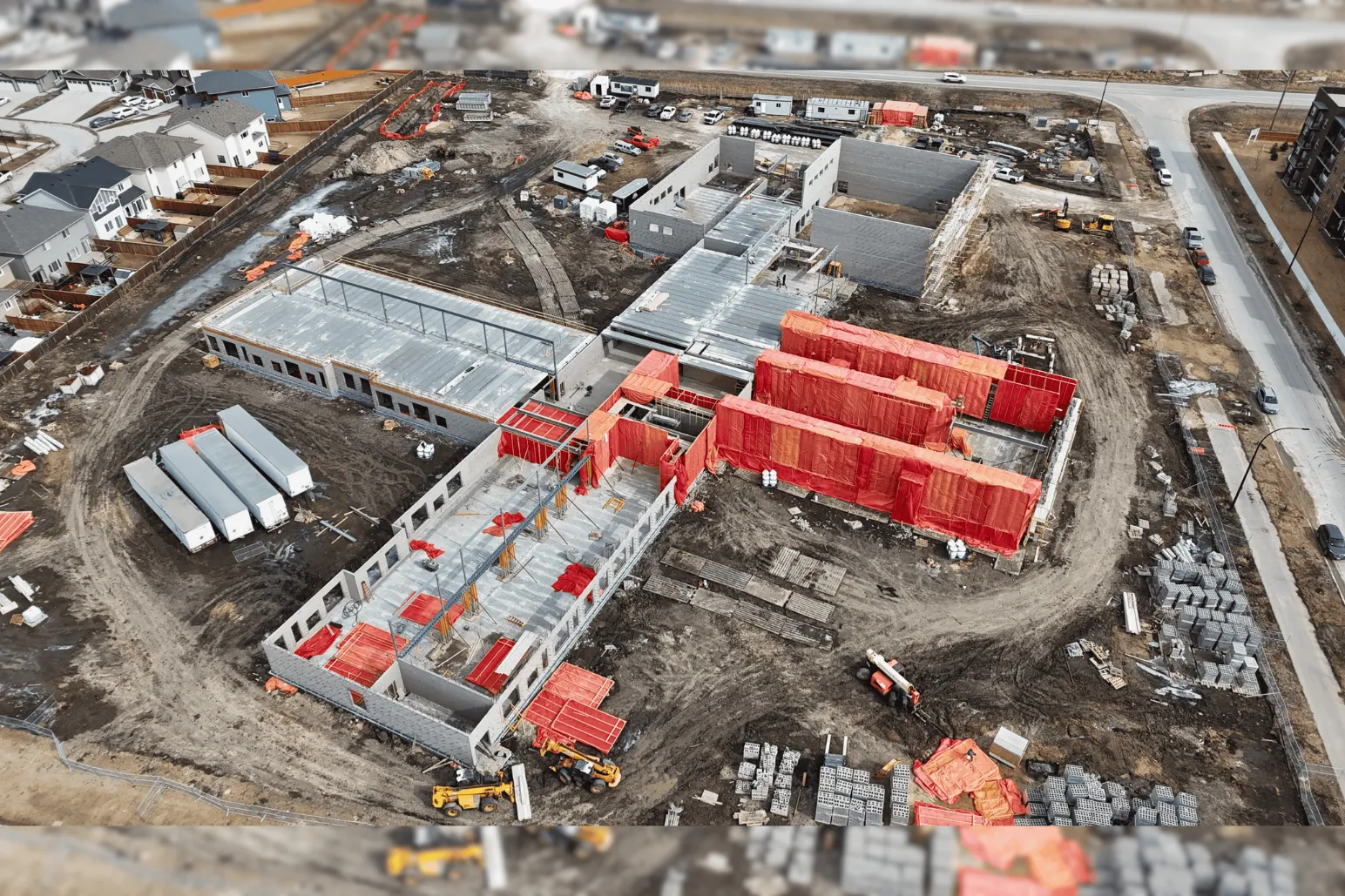Construction site development for École Mino Pimatisiwin school by Parkwest Projects