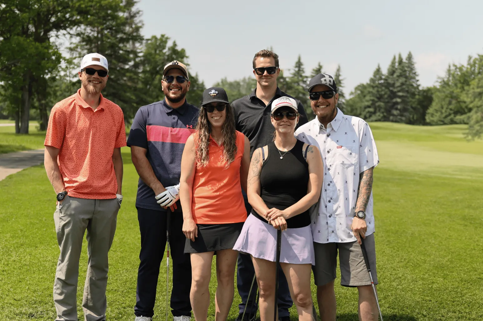 Golf foursome at Merit Manitoba construction industry tournament