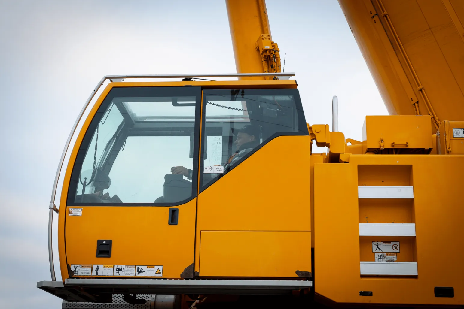 Able Crane Services lifting steel bridge girders for MD Steele Construction in Melita Manitoba