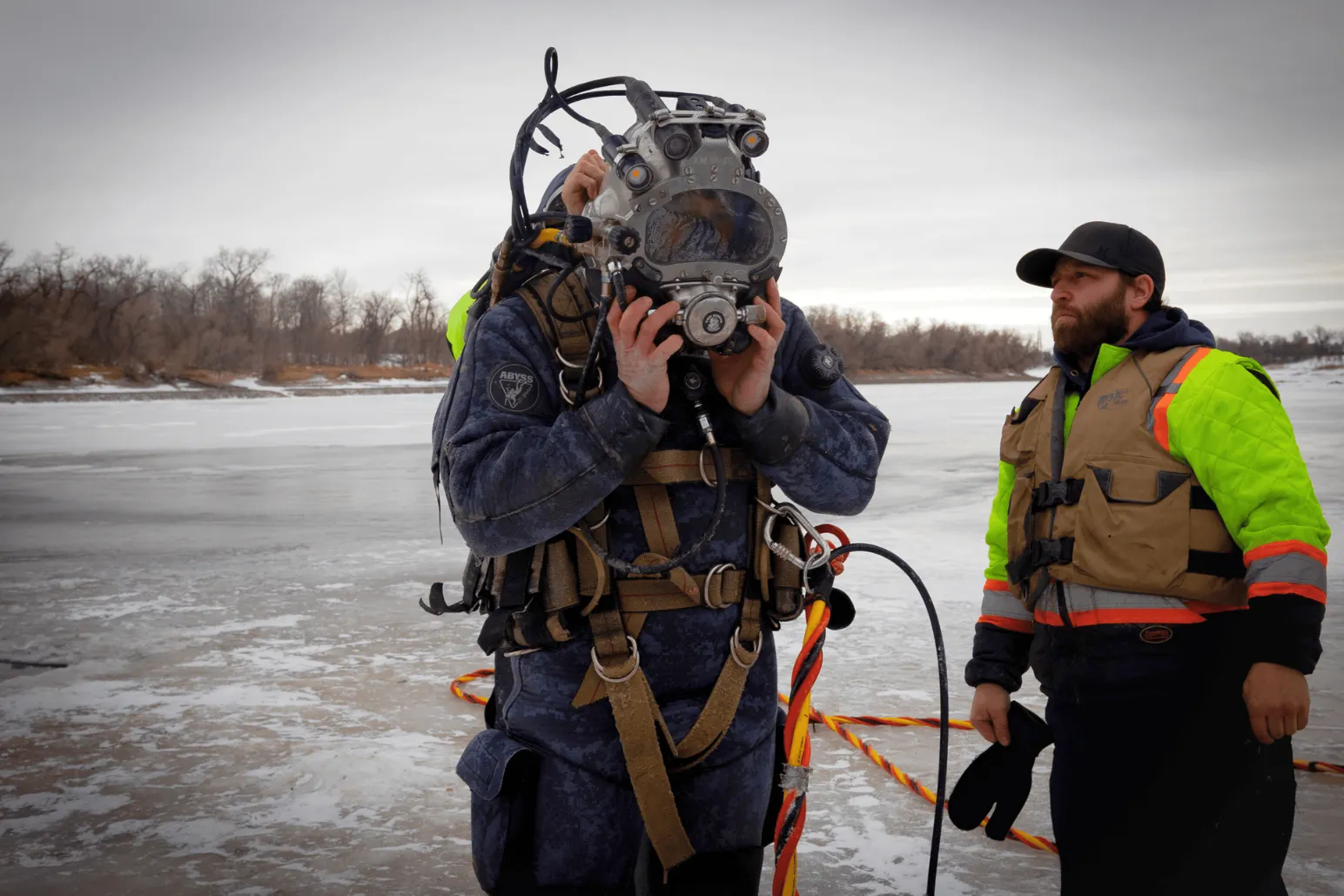 Dominion Divers demonstrating underwater construction expertise on Red River Manitoba