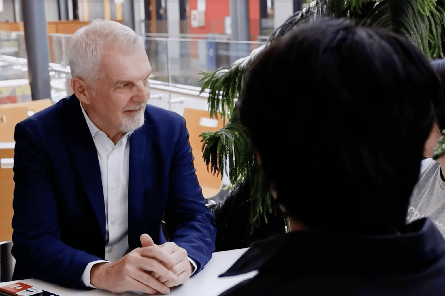 Construction industry executive presenting Canerector scholarship to support skilled trades education Manitoba