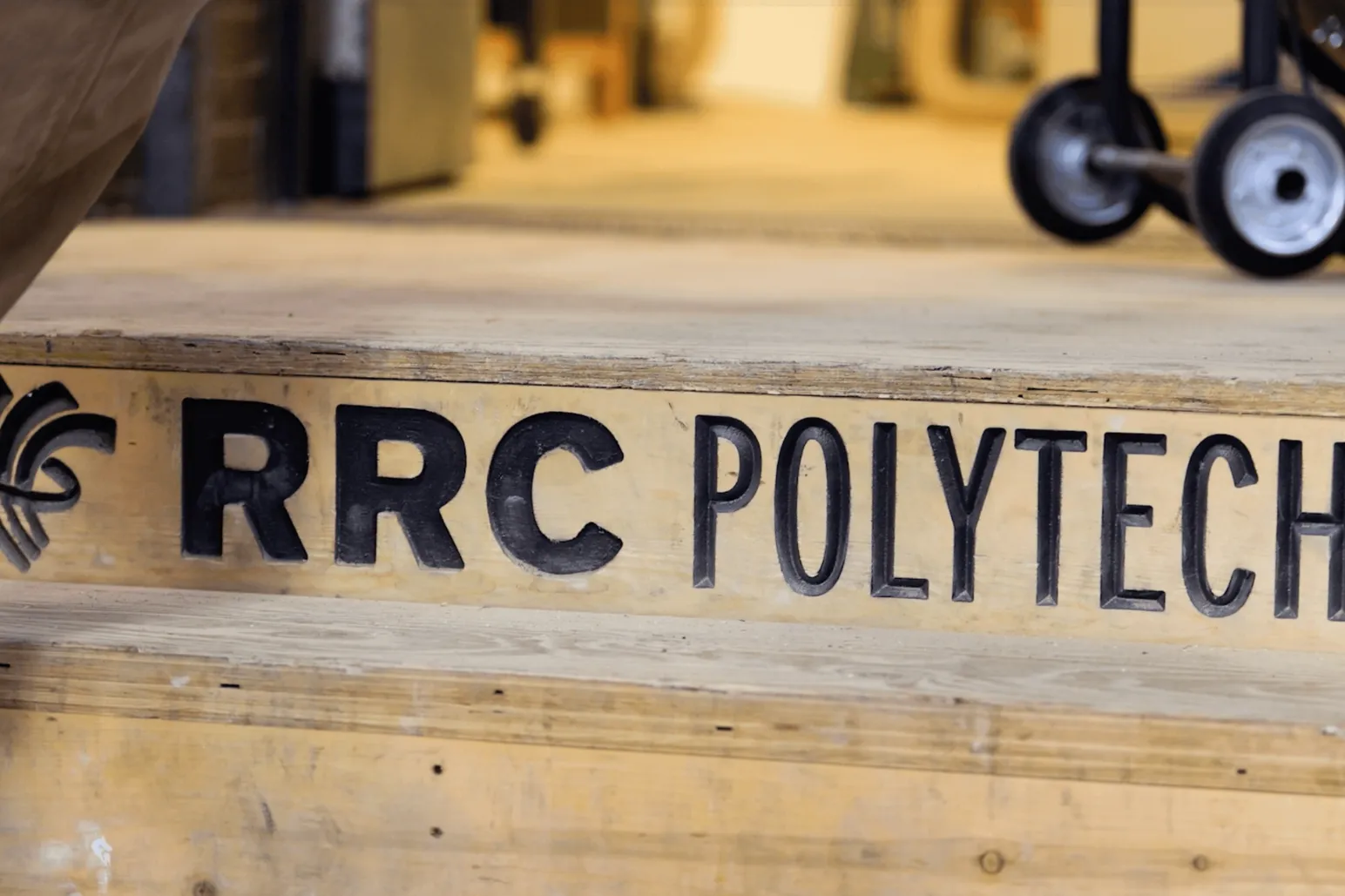 RRC Polytech branded lumber showcasing carpentry and construction trades programs in Winnipeg Manitoba