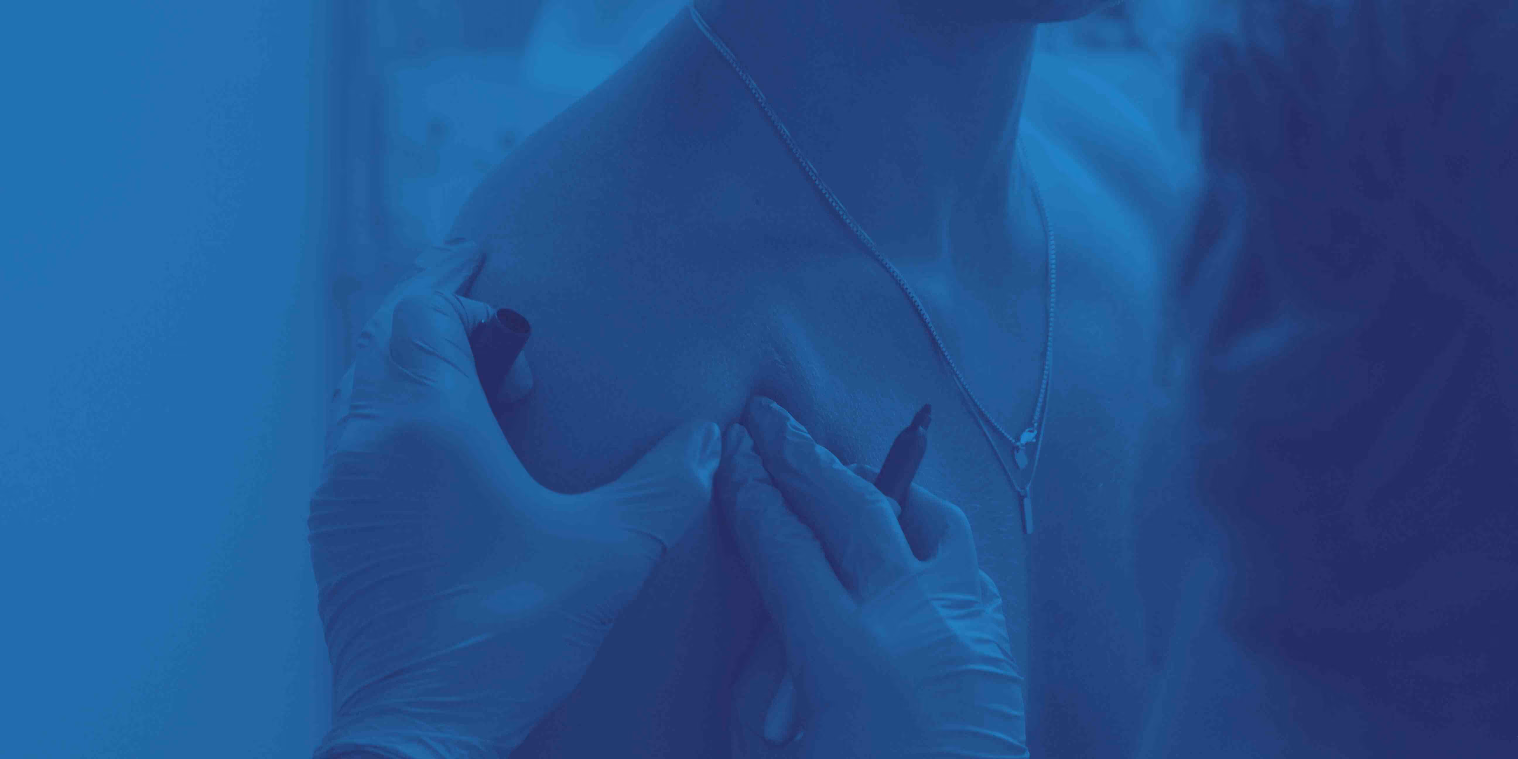 Dr. Bridger Cutler prepares a patient shoulder for Platelet-Rich Plasma (PRP) and ozone injection therapy in Utah Valley