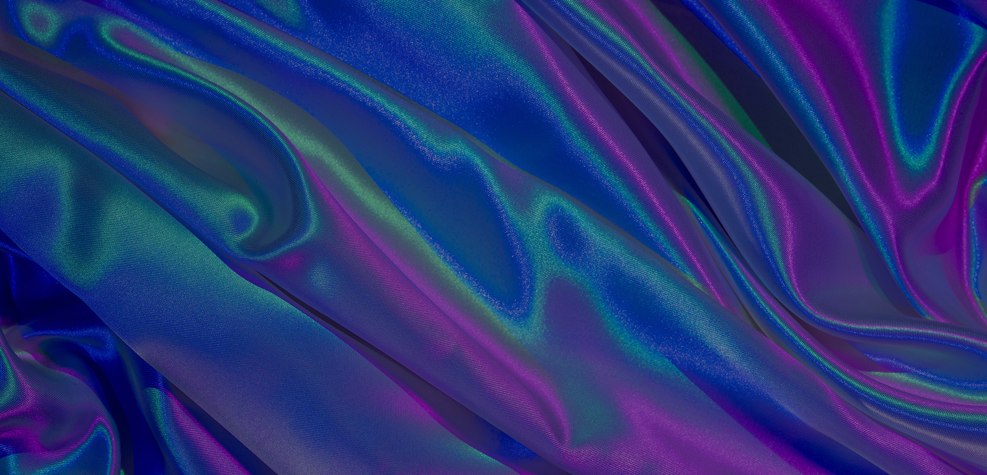 Tissu satinée plissé aux reflets bleu, violet et vert irisés.
