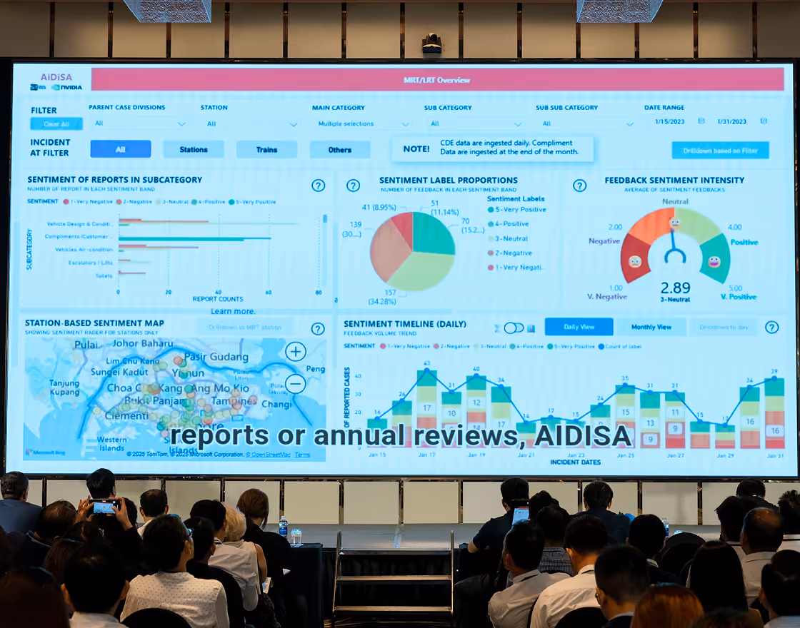 Three people seated on armchairs participating in a panel discussion, with a round table holding bottles of water in front of them.