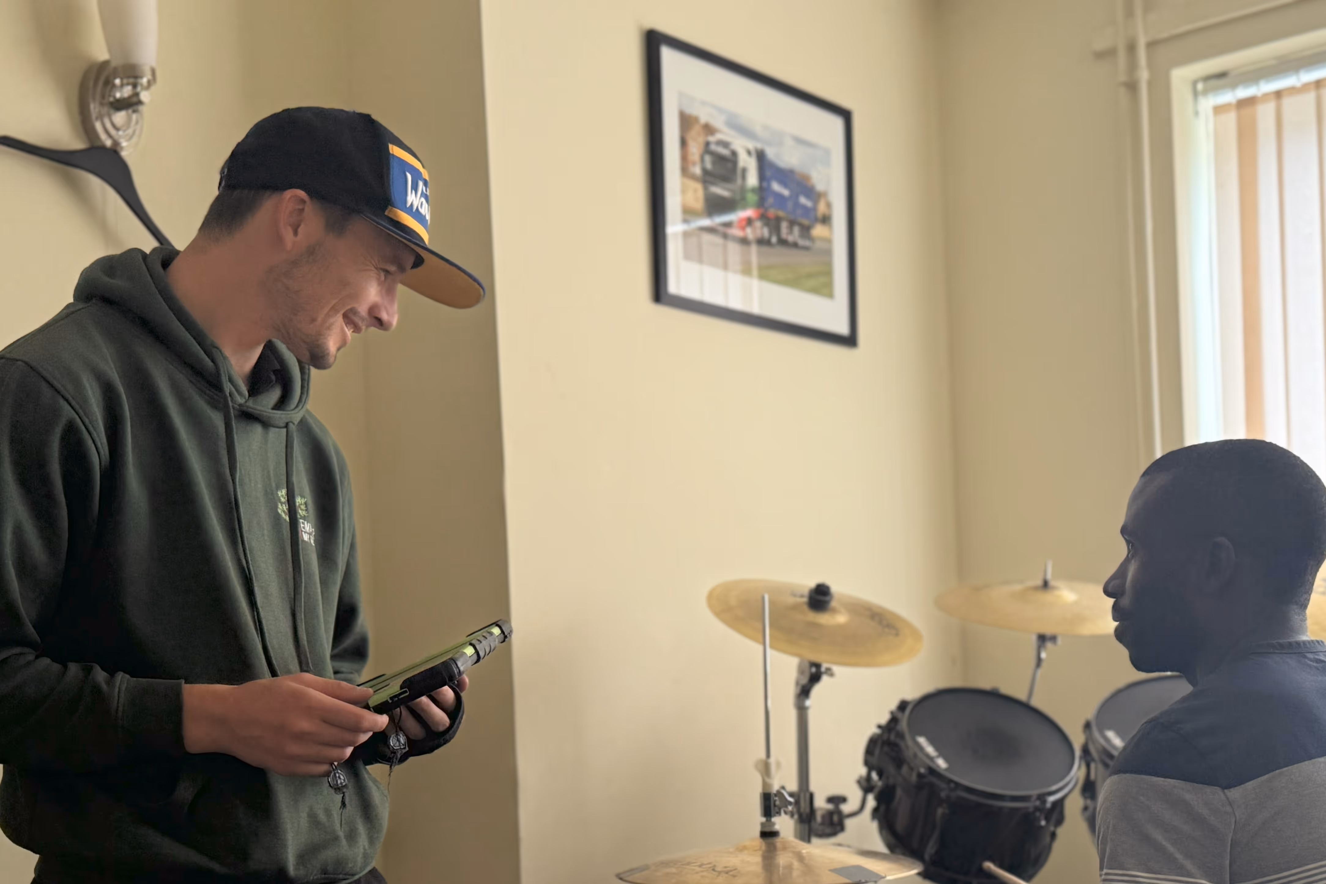 You first supporting a man playing drums