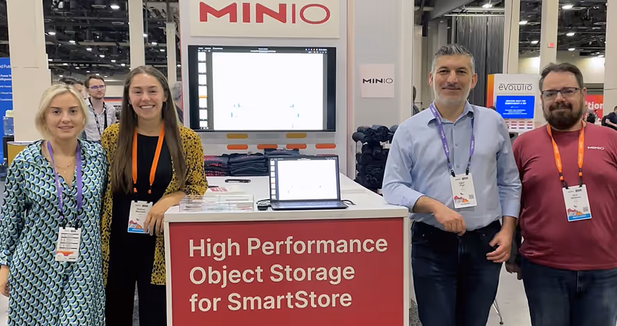 Minio team at conference booth showcasing high-performance object storage technology